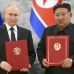 O presidente russo Vladimir Putin, à esquerda, e o líder da Coreia do Norte, Kim Jong Un